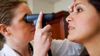Neurologists review an imaging scan of a brain